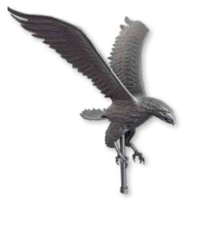 Black bird sculpture with outstretched wings.