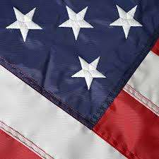 Close-up of American flag stars and stripes.