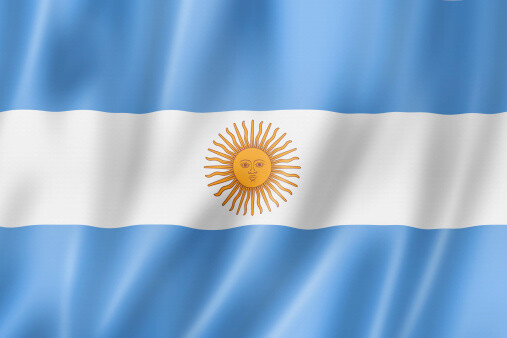 Argentinian flag with sun emblem on blue and white