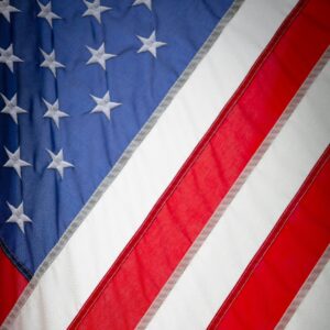 Close-up of American flag with stars and stripes.